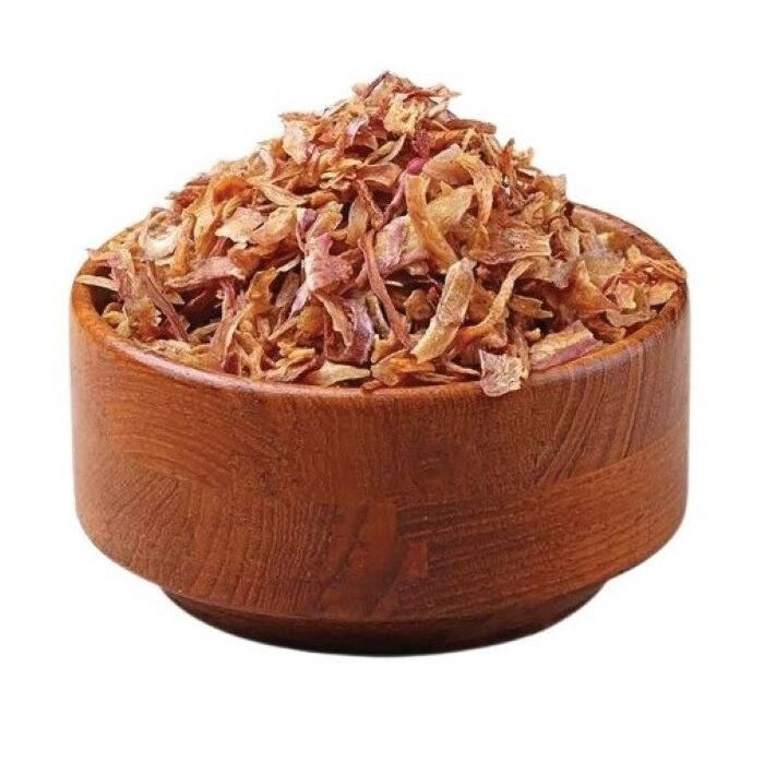 Close-up of golden brown, crispy Fresh Fried Onion Flakes (Birista). Premium quality product from Krushi Food Industries, ideal for biryani and gravy thickening.
